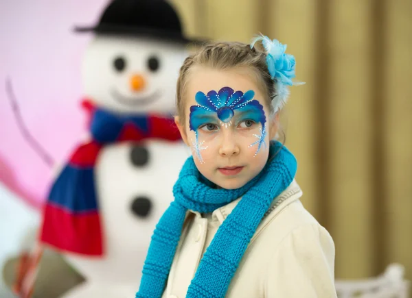 Portrait of little girl with Christmas face painting — Stock Photo, Image