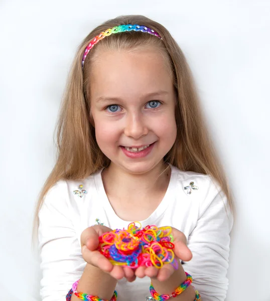 Loom bags craft Little girl demonstrating her works — Stock Photo, Image