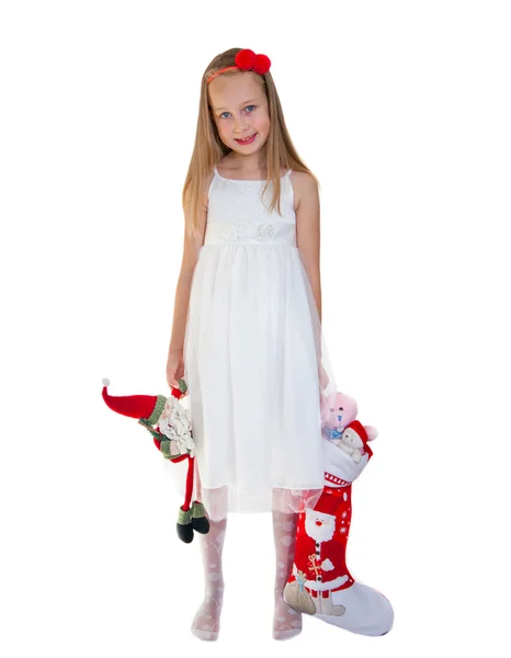 Happy little girl with Christmas presents — Stock Photo, Image