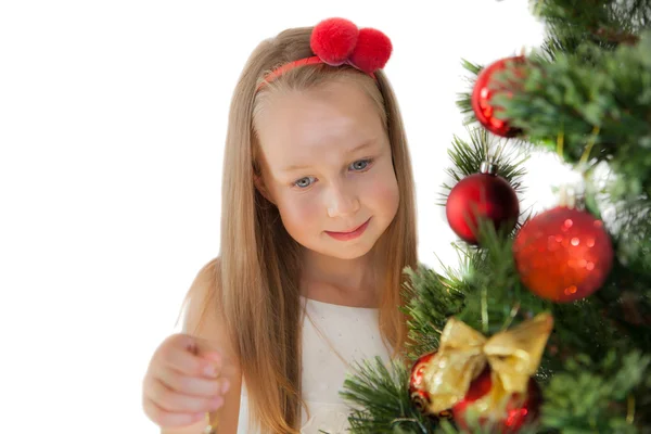 Happy little girl with Christmas tree — Stock Photo, Image