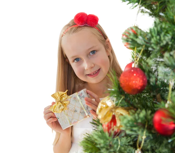 Happy little girl with Christmas tree — Stock Photo, Image