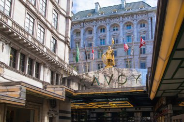 LONDON, UK - 22 JULY, 2014: Savoy hotel, one of the best holes in London and Europe. Main entrance clipart