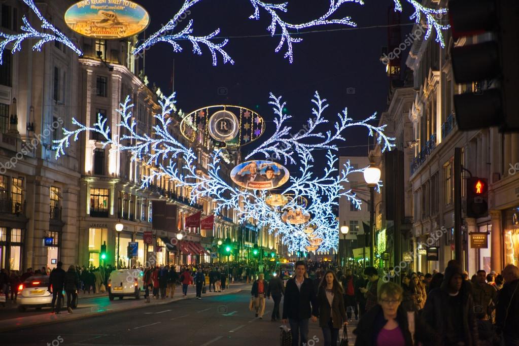 LONDON, UK - NOVEMBER 30, 2014: Black Friday Weekend In London The LONDON, UK - NOVEMBER 30, 2014: Black Friday weekend in London the first sale before Christmas. Regent street beautifully decorated with Christmas lights. - LONDON, UK - NOVEMBER 30, 2014: Black Friday Weekend In London The