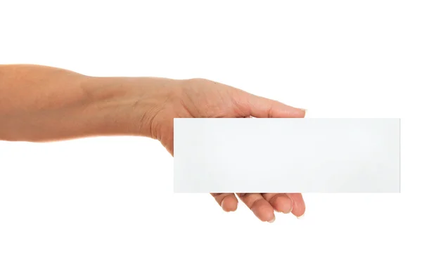 Hand holding white paper, cardboard. White background with space for text — Stock Photo, Image