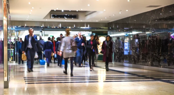 Business people moving blur. People walking in rush hour. Business and modern life concept — Stock Photo, Image