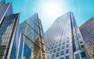 Architectural composition made of modern glass buildings. Abstract business background