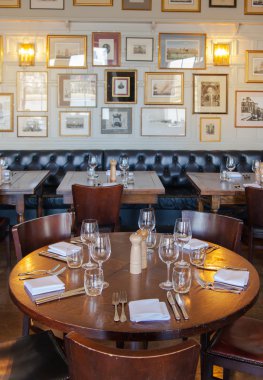 LONDON, UK - APRIL 14, 2015: Old English victorian public house interior. Early morning settings with no people