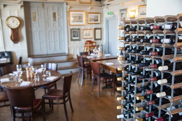 LONDON, UK - APRIL 14, 2015: Old English victorian public house interior. Early morning settings with no people