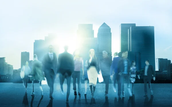 Business background with walking people blur silhouettes — Stockfoto