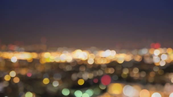 Las luces de la ciudad se difuminan por la noche. Londres — Vídeo de stock