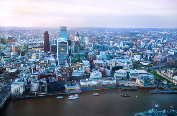 LONDON, UK - APRIL 15, 2015: City of London panorama in sunset.