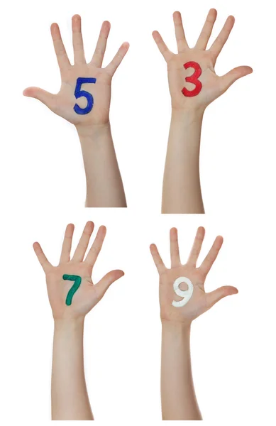 Numbers painted on children hands.  Rises up hands. — Stock Photo, Image