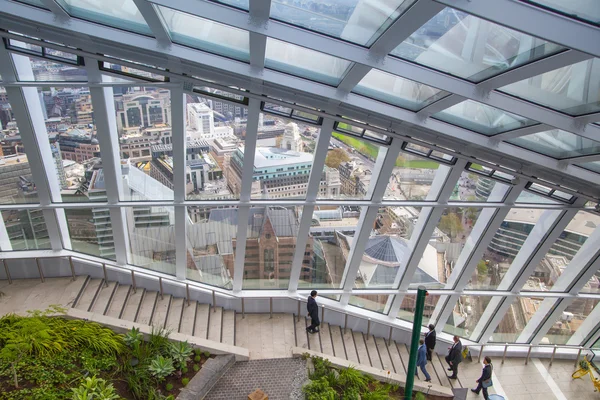 LONDON, UK - APRIL 22, 2015: Sky garden side stairs with walking business people — Stok fotoğraf