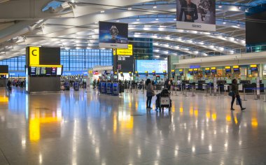 LONDON, UK - MARCH 28, 2015: International departure hall. Interior of  Heathrow airport Terminal 5. New building