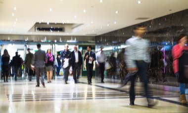 Business people blur. People walking in rush hour. Business and modern life concept