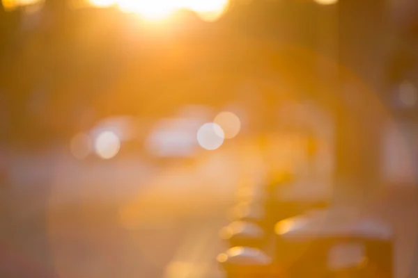 Sunset in London. Blur background include road and traffic lights — Stok fotoğraf