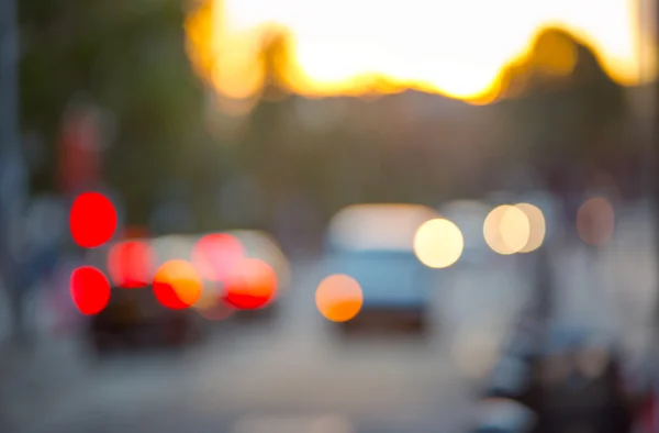 Sunset in London. Blur background include road and traffic lights — Stok fotoğraf