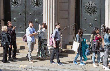 LONDON UK - SEPTEMBER 19, 2015: Queue on the Bank street. People waiting to see Bank of England in open day event