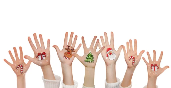 Χριστουγεννιάτικα σύμβολα ζωγραφισμένο στα χέρια του παιδιού. Σάντα, χιονάνθρωπος, χριστουγεννιάτικο δέντρο, το παρόν πλαίσιο, τάρανδος κλπ — Φωτογραφία Αρχείου
