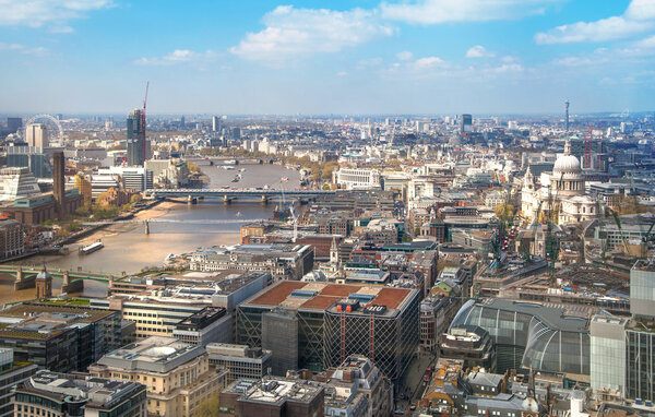 LONDON, UK - SEPTEMBER 17, 2015: City of London aerial view, river Thames and bridges. London panorama form 32 floor of Walkie-Talkie building