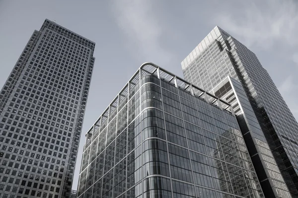 London, Großbritannien - 18. Mai 2015: Bankhauptquartiere in der Canary Mole. Bürogebäude bei Sonnenuntergang — Stockfoto