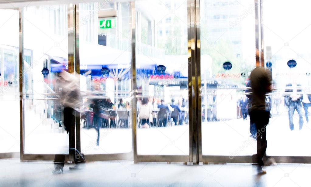 London, People blur background. People walking in the hall of office building