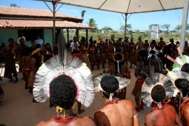 santa cruz cabralia, bahia / brazil - april 19, 2009: Pataxo Indians are seen during disputes at indigenous games in the Coroa Vermelha village in the city of Santa Cruz Cabralia. clipart