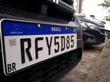salvador, bahia, brazil - december 27, 2020: vehicle plate in the Mercosur standard is seen in the city of Salvador clipart