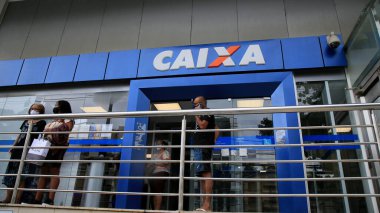 salvador, bahia, brazil - january 15, 2021: people are seen in line at Caixa Economica Federal, in downtown Salvador. *** Local Caption *** clipart