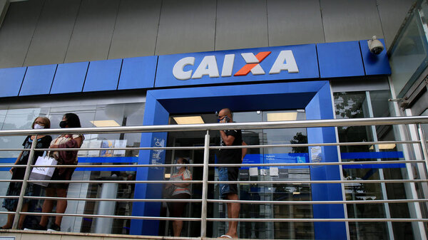 salvador, bahia, brazil - january 15, 2021: people are seen in line at Caixa Economica Federal, in downtown Salvador. *** Local Caption ***