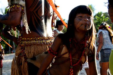 santa cruz cabralia, bahia / brazil - april 19, 2009: Pataxo Indians are seen during disputes at indigenous games in the Coroa Vermelha village in the city of Santa Cruz Cabralia. clipart