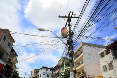 salvador, bahia, brazil - january 27, 2021: electric power transformer is seen next to wires on a power grid pole in the city of Salvador.