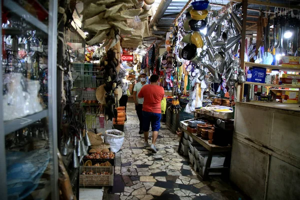 stock image salvador, bahia, brazil - june 28, 2021: People are seen shopping at Sao Joaquim fair in Salvador city.