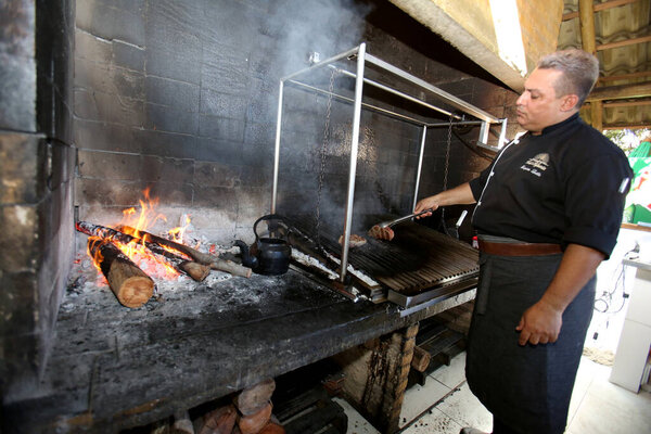salvador, bahia, brazil - december 14, 2016: barbecue grill is seen roasting meat in a restaurant in the city of Salvador. *** Local Caption ***