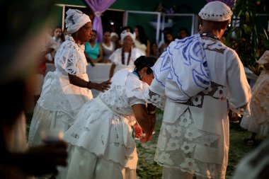 simoes filho, bahia, barazil - february 27, 2016: integrants of the Candomble religion are seen during a religious celebration in a terreiro in the city of Simoes Filho.
