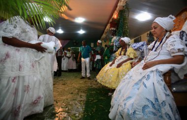 simoes filho, bahia, barazil - february 27, 2016: integrants of the Candomble religion are seen during a religious celebration in a terreiro in the city of Simoes Filho.