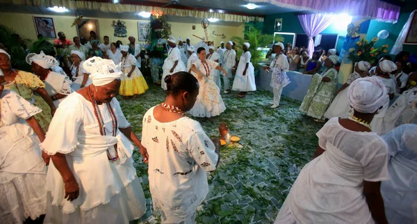 simoes filho, bahia, barazil - february 27, 2016: integrants of the Candomble religion are seen during a religious celebration in a terreiro in the city of Simoes Filho.
