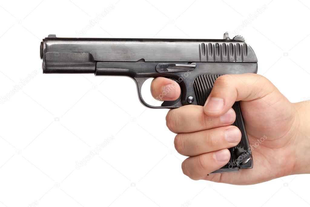 Men's hand with a gun isolated on white