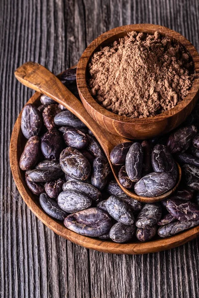 Frijoles Cacao Secos Enteros Cuchara Tazón Madera Sobre Fondo Rústico — Foto de Stock