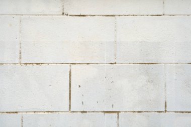 Klasik duvar kağıdı veya doku arkaplanı için boş eski beyaz tuğla duvar