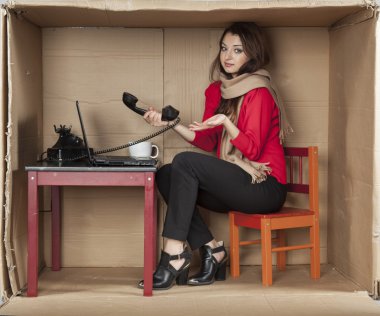 clumsy secretary working in the office