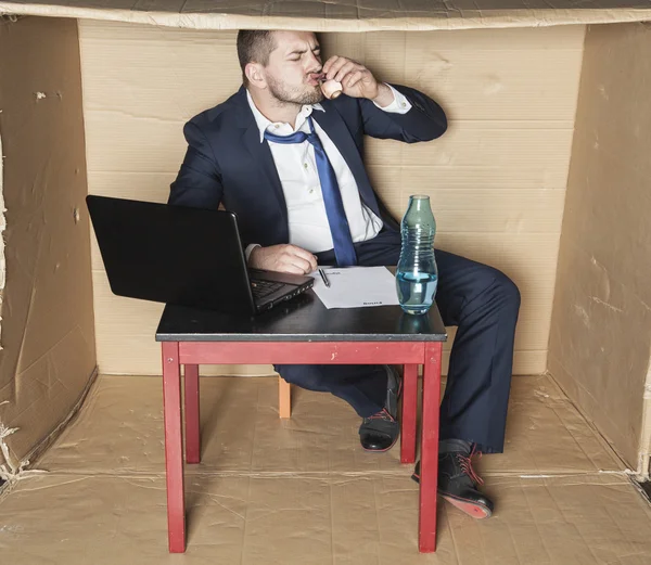 Businessman drinking alcohol before signing — Stock Photo, Image