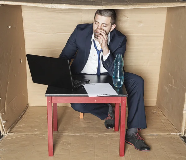 Sad businessman drinking alcohol — Stock Photo, Image