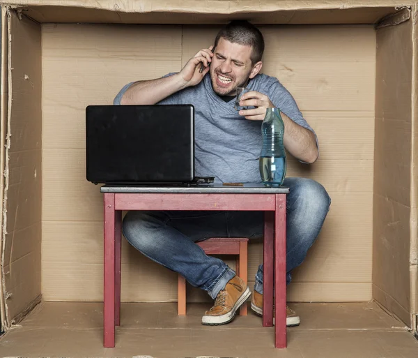 Drunk intern talking on the phone — Stock Photo, Image