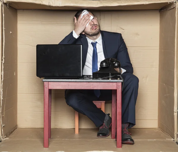 Businessman wipes his forehead — Stock Photo, Image