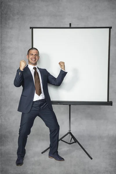 Erfolgreicher Geschäftsmann glücklich bei der Arbeit — Stockfoto