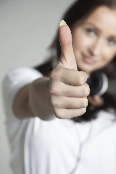 Thumbs up for sports and music — Stock Photo, Image