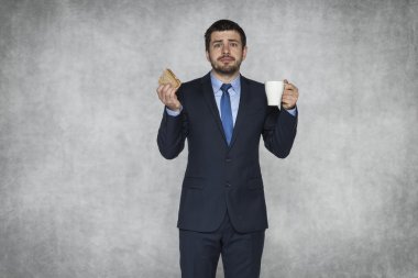 işadamı bir kahve ve bir sandviç