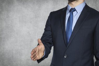 iş adamı karşılamaya elini tutar