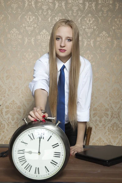 Business woman with the clock — Stock Photo, Image